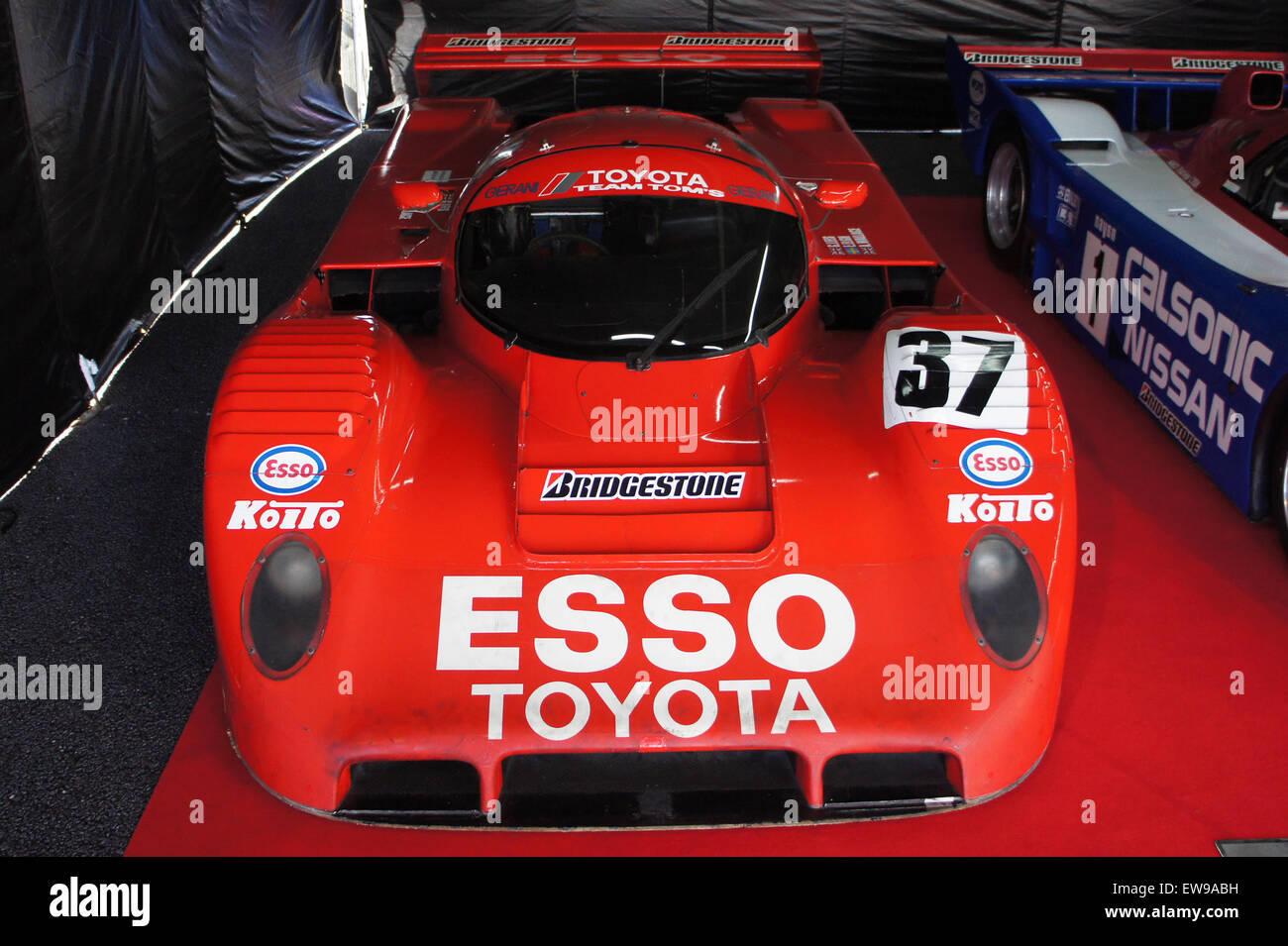 The Toyota 91C-V, featuring the Esso livery, is a race car that competed in the 2012 World Endurance Championship at Fuji. This image shows the car's front view, showcasing its aerodynamic design and advanced engineering for high-speed endurance racing. Stock Photo
