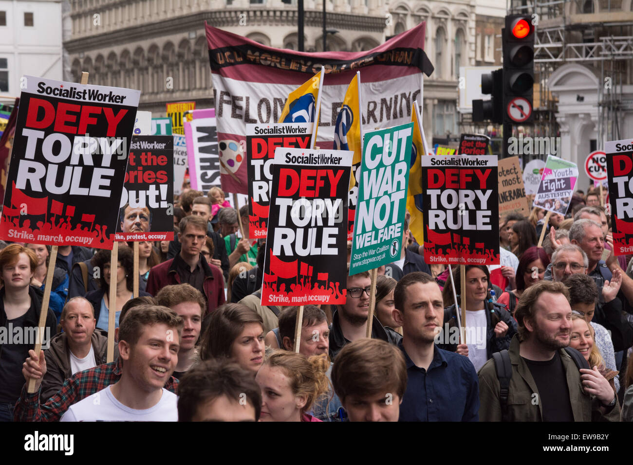 London, 20th June 2015. Protesters march from the Bank of England to Parliament square to protest cuts to the NHS, the welfare state, education and public services. The march, organised by the People’s Assembly Against Austerity, saw tens of thousands of people parade through central London Credit:  Patricia Phillips/Alamy Live News Stock Photo