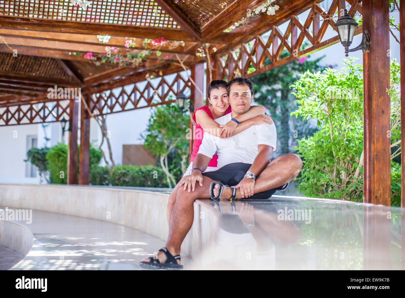 Man hugs woman on hi-res stock photography and images - Alamy