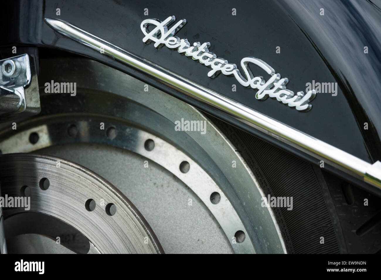 PAAREN IM GLIEN, GERMANY - MAY 23, 2015: Fragment of a motorcycle Harley-Davidson Heritage Softail. The oldtimer show in MAFZ. Stock Photo