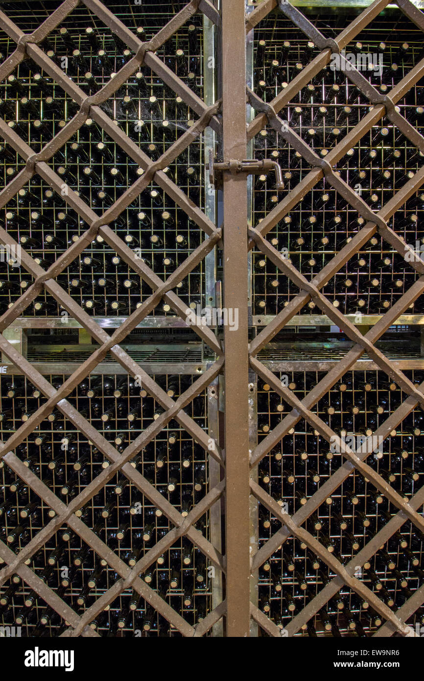 View of a large wine bottle storage locked in a cellar Stock Photo Alamy