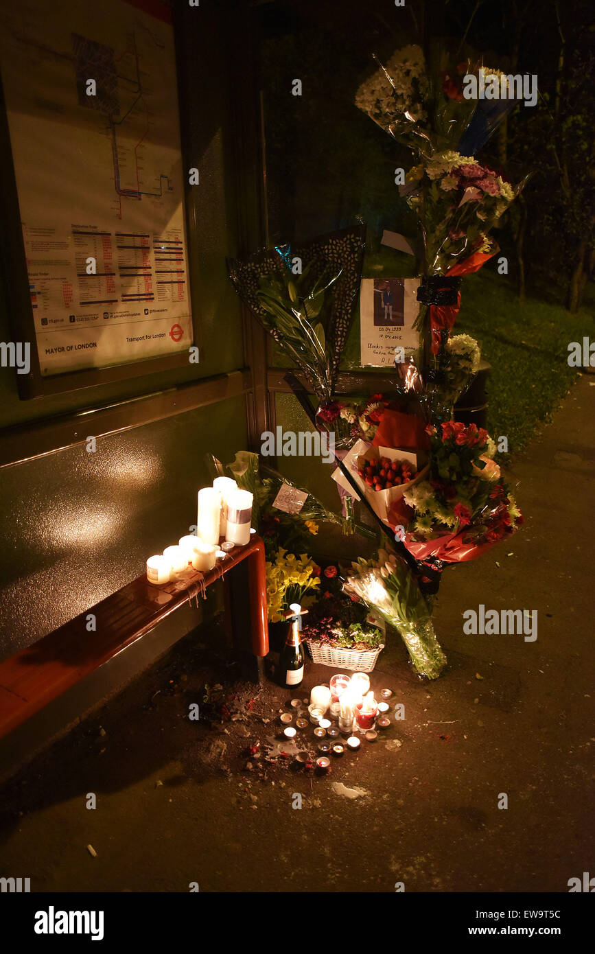 Floral tributes for a 20-year-old motorbike rider and his 16-year-old passenger who have been killed after a crash on Woodford Avenue at the junction with Lord Avenue, involving a pedestrian on 18 May 2015  Where: London, United Kingdom When: 19 Apr 2015 Stock Photo