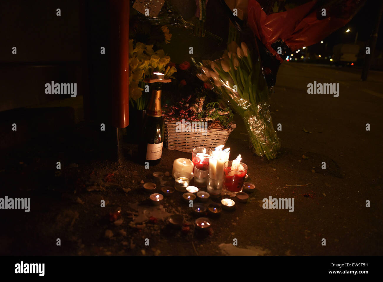 Floral tributes for a 20-year-old motorbike rider and his 16-year-old passenger who have been killed after a crash on Woodford Avenue at the junction with Lord Avenue, involving a pedestrian on 18 May 2015  Where: London, United Kingdom When: 19 Apr 2015 Stock Photo