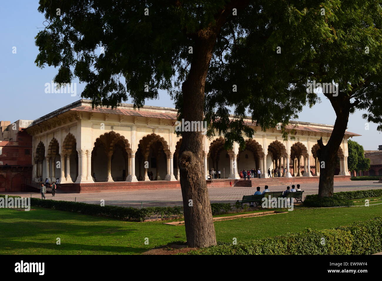 Tourists relaxing in Agra Fort Hall of Public Audience Building Outside