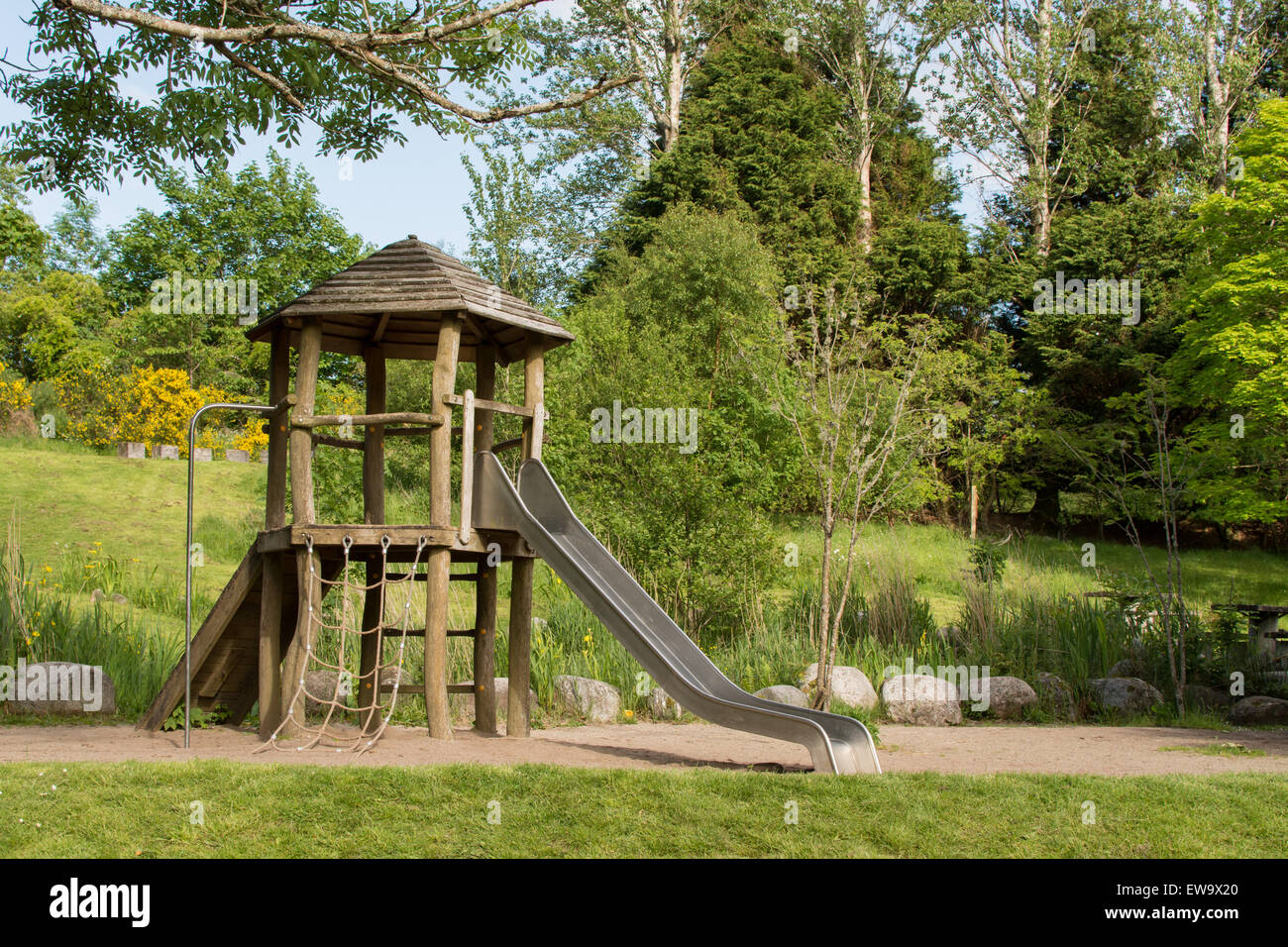 children's empty play area in natural surroundings - Balmaha, Loch Lomond and Trossachs National Park Visitor Centre, Scotland, Stock Photo