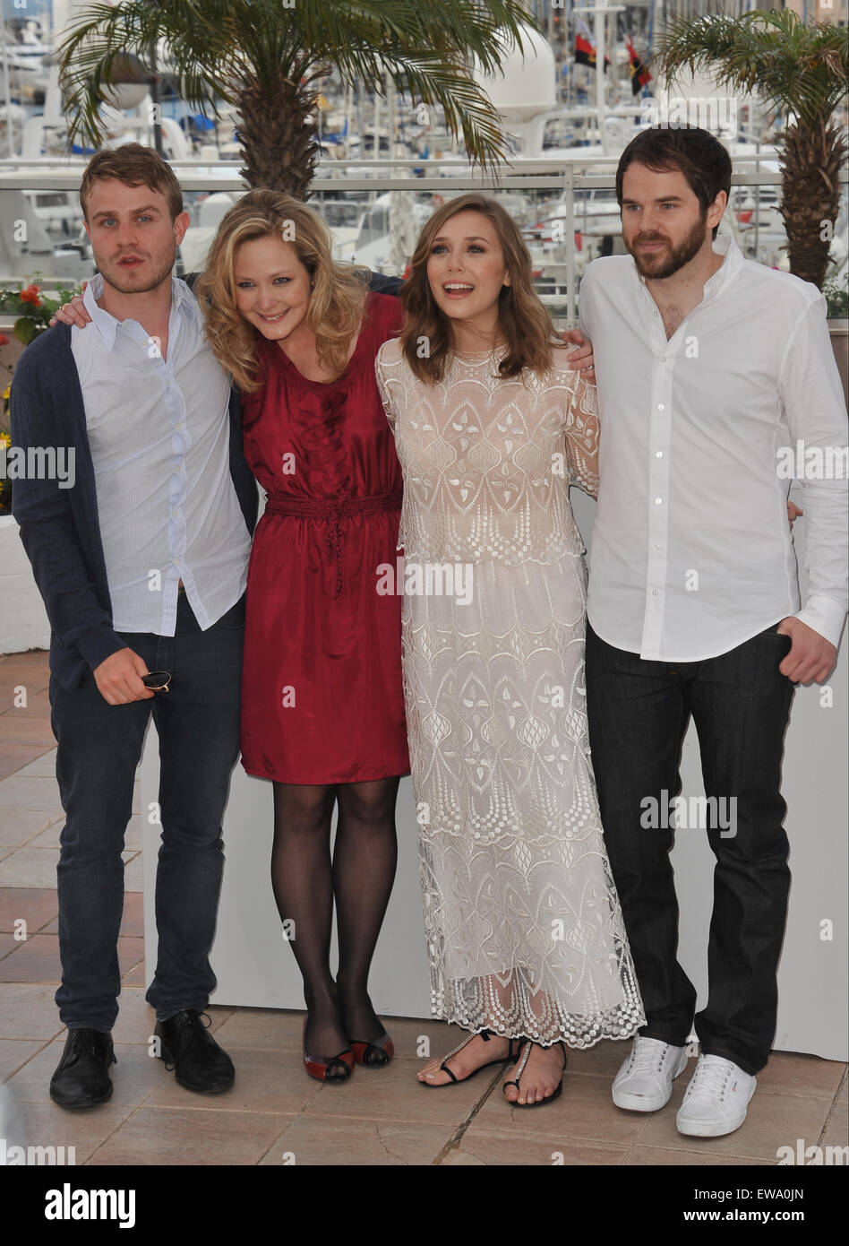 CANNES, FRANCE - MAY 15, 2011: LtoR: Brady Corbet & Louisa Krause & Elizabeth Olsen & director Sean Durkin at the photocall for their movie 'Martha Marcy May Marlene' at the 64th Festival de Cannes. Stock Photo