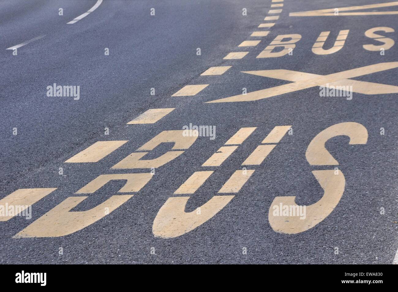 Bus sign on the road Stock Photo - Alamy