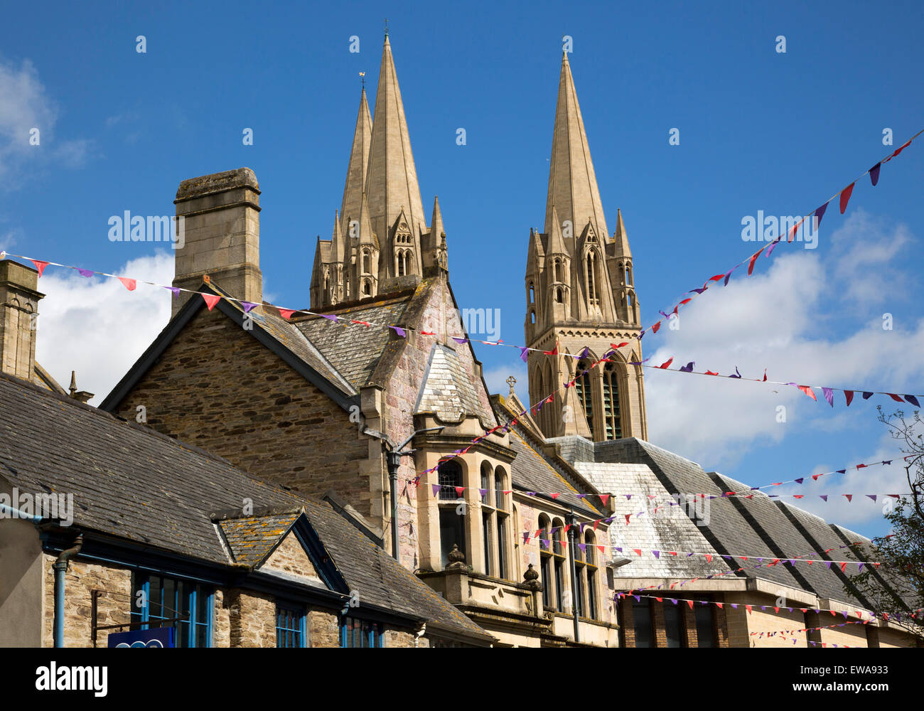 Spires of cathedral rise above historic town centre buildings, Truro, Cornwall, England, UK Stock Photo