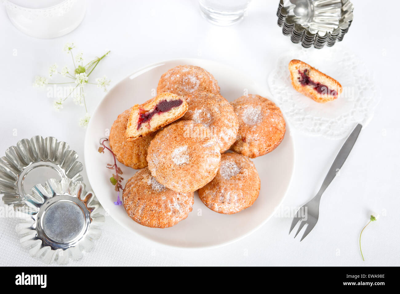 Sweet tarts filled with wild berry jam. Stock Photo