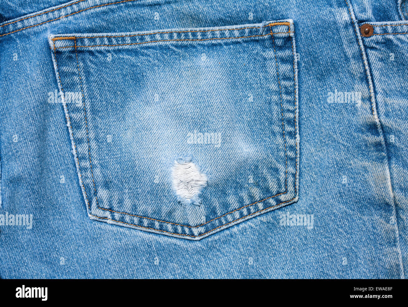 Old Worn Jeans. Stock Photo