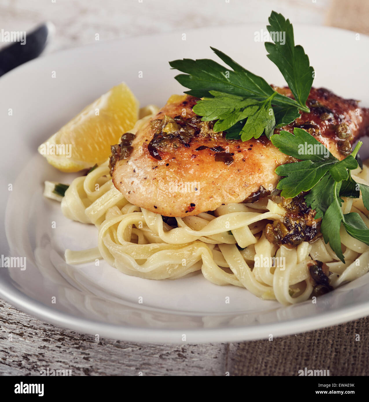 Chicken Fillet With Pasta,Parmesan Cheese And Capers Stock Photo Alamy