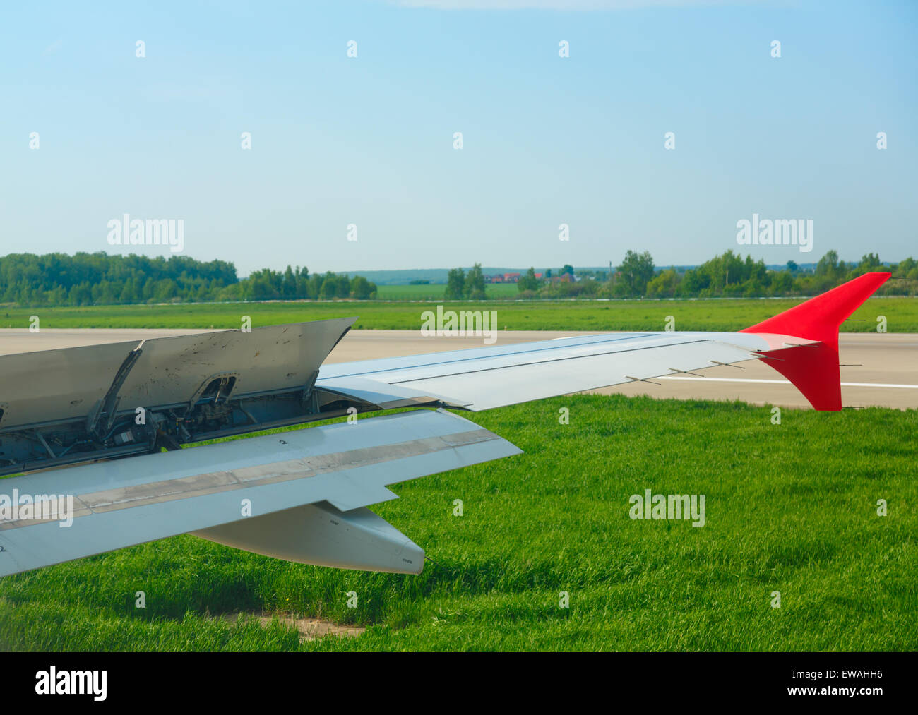 View on wing with brakes on, during landing at Domodedovo airport, Moscow Stock Photo
