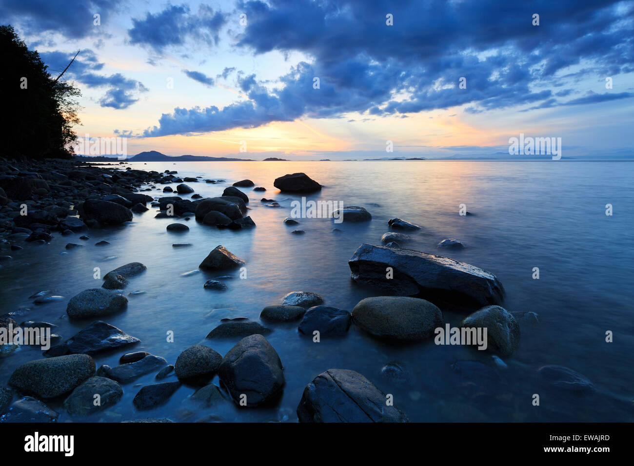 Sunset views over Georgia Strait from beach in north Nanaimo, Vancouver Island, British Columbia Stock Photo