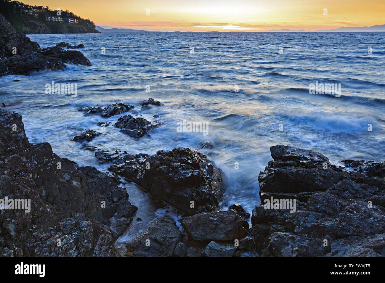 Sunset over Georgia Strait from Neck Point Municipal Park, north Nanaimo, Vancouver Island, British Columbia Stock Photo