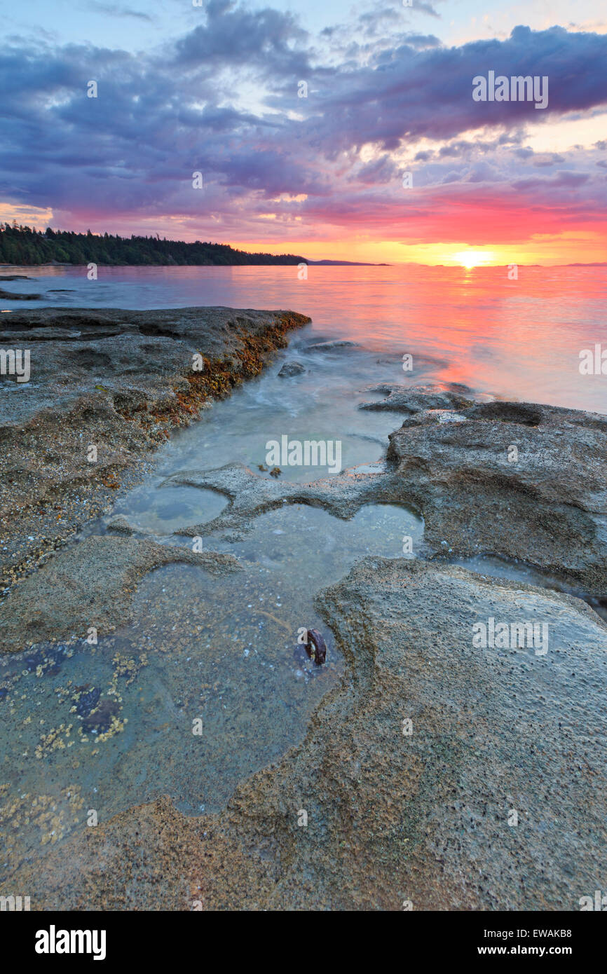 Sunset over Georgia Strait from beach in north Nanaimo, Vancouver Island, British Columbia Stock Photo