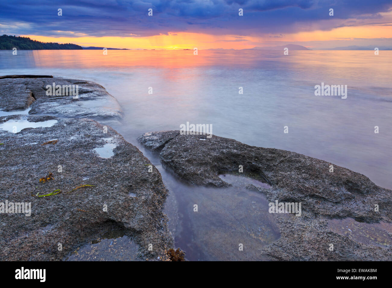 Sunset over Georgia Strait from beach in north Nanaimo, Vancouver Island, British Columbia Stock Photo