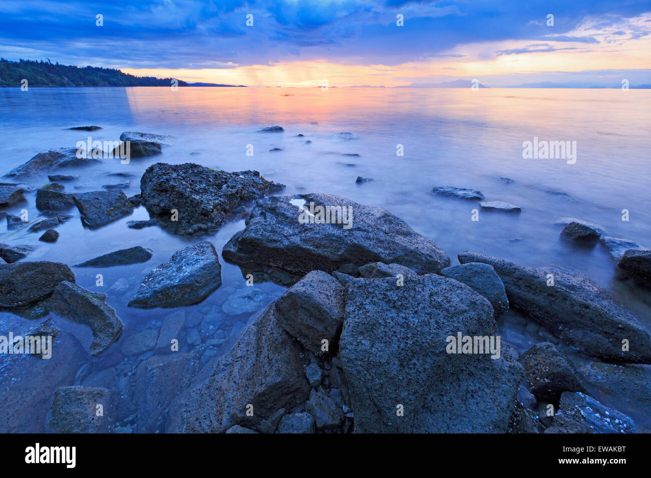 Sunset over Georgia Strait from beach in north Nanaimo, Vancouver Island, British Columbia Stock Photo