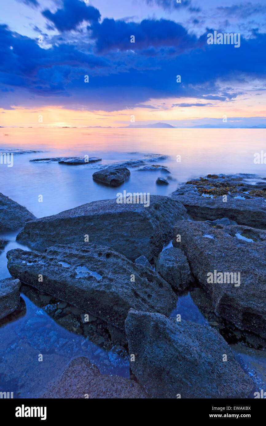 Sunset over Georgia Strait from beach in north Nanaimo, Vancouver Island, British Columbia Stock Photo