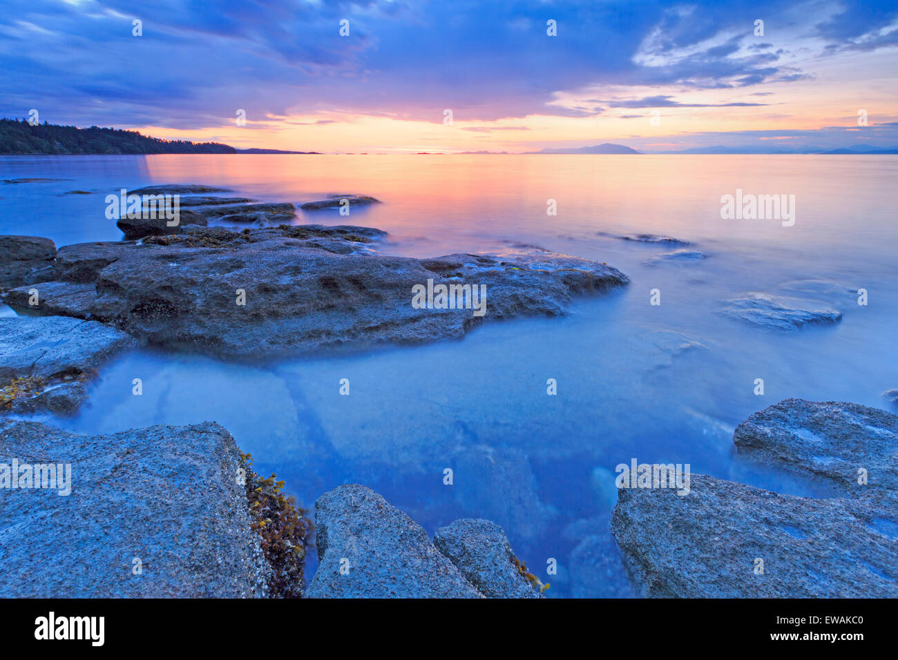 Sunset over Georgia Strait from beach in north Nanaimo, Vancouver Island, British Columbia Stock Photo