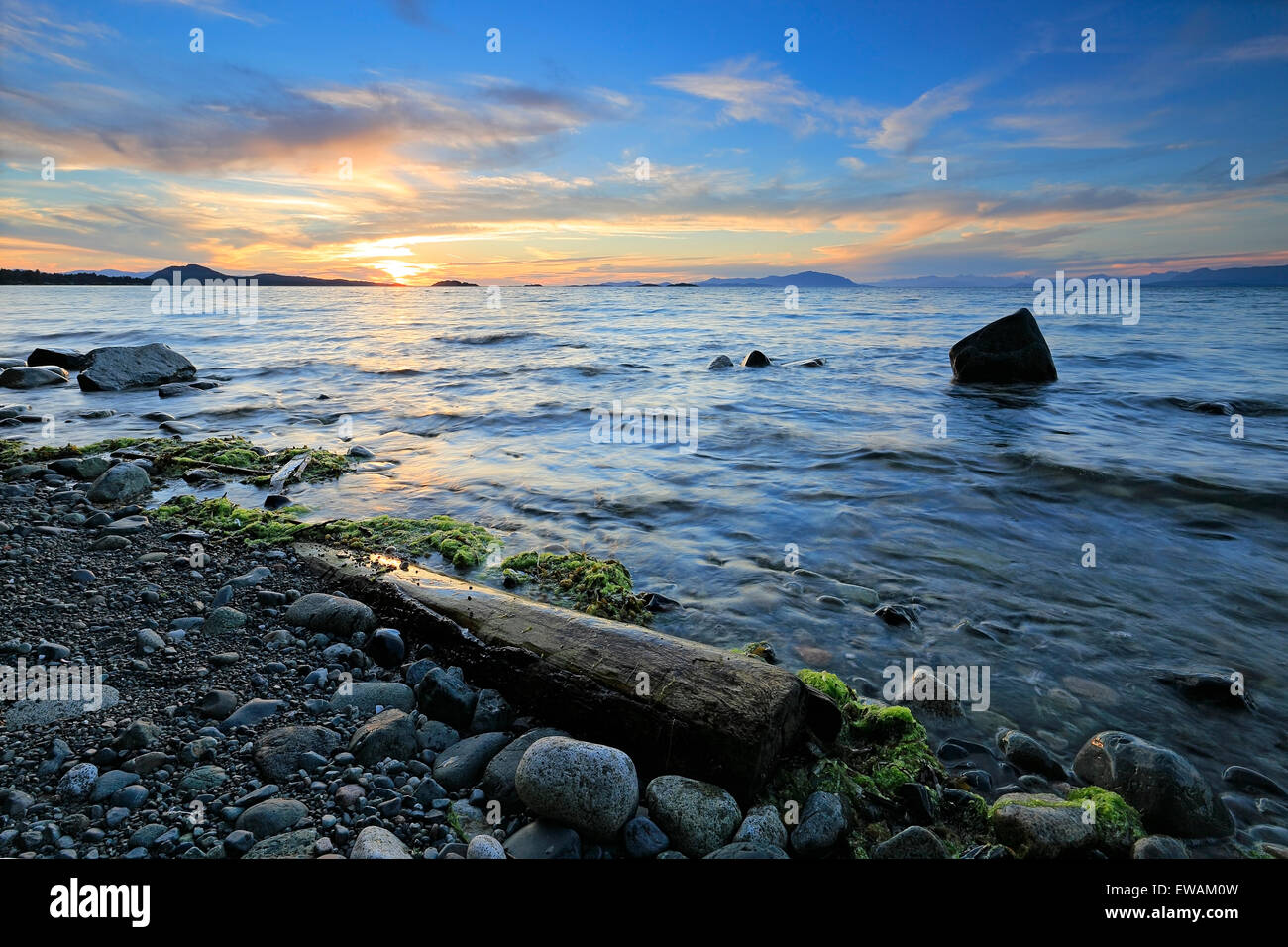 Sunset over Georgia Strait from north of Nanaimo looking towards the Winchelsea Islands, Vancouver Island, British Columbia Stock Photo