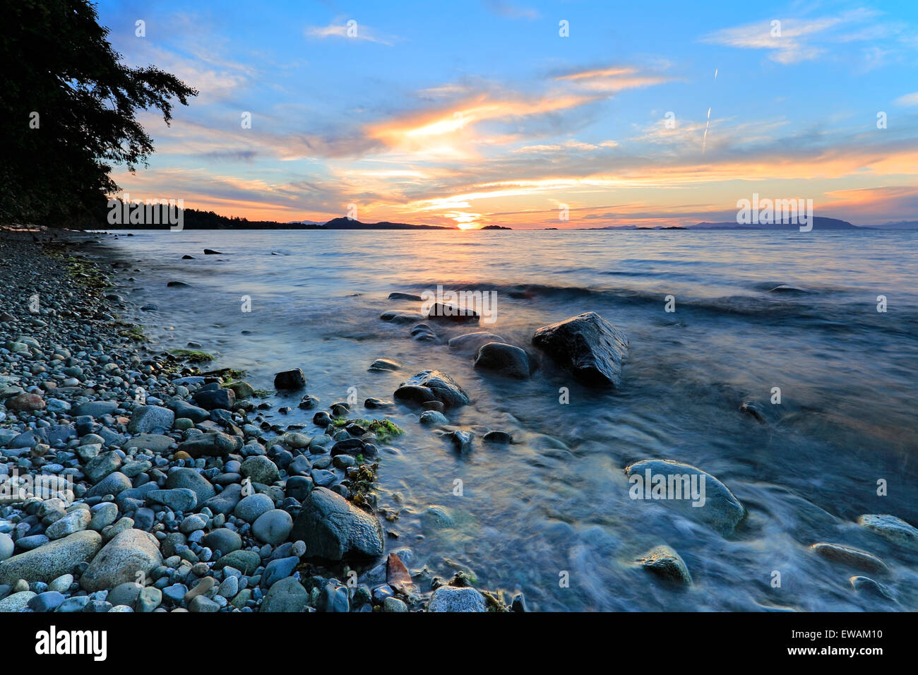 Sunset over Georgia Strait from north of Nanaimo looking towards the Winchelsea Islands, Vancouver Island, British Columbia Stock Photo