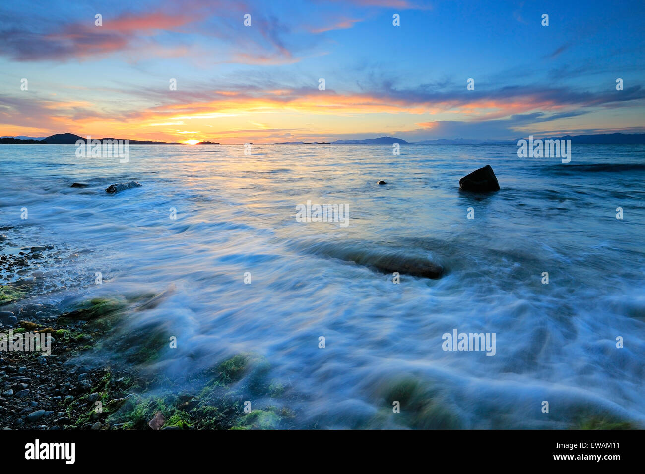 Sunset over Georgia Strait from north of Nanaimo looking towards the Winchelsea Islands, Vancouver Island, British Columbia Stock Photo