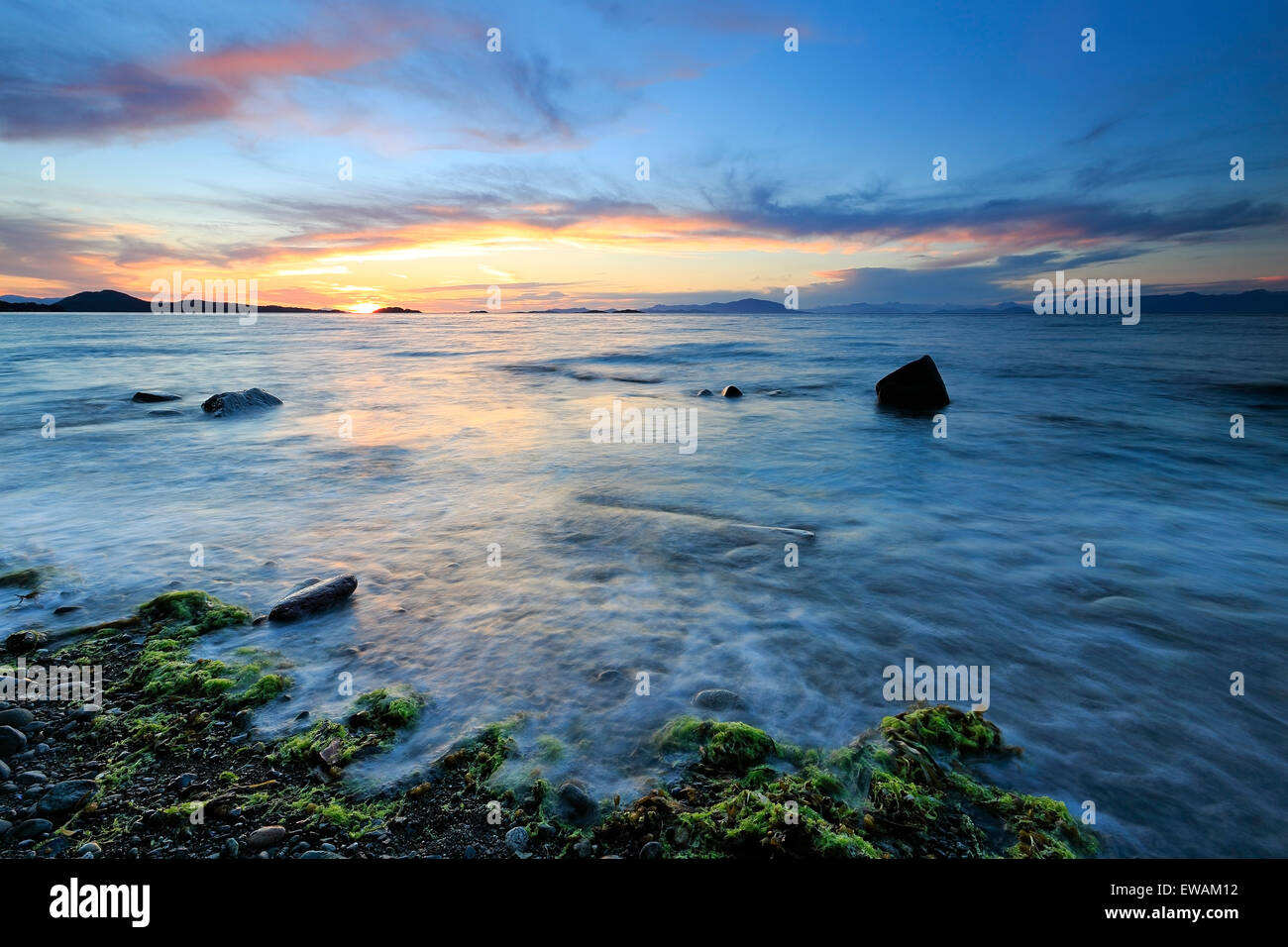 Sunset over Georgia Strait from north of Nanaimo looking towards the Winchelsea Islands, Vancouver Island, British Columbia Stock Photo