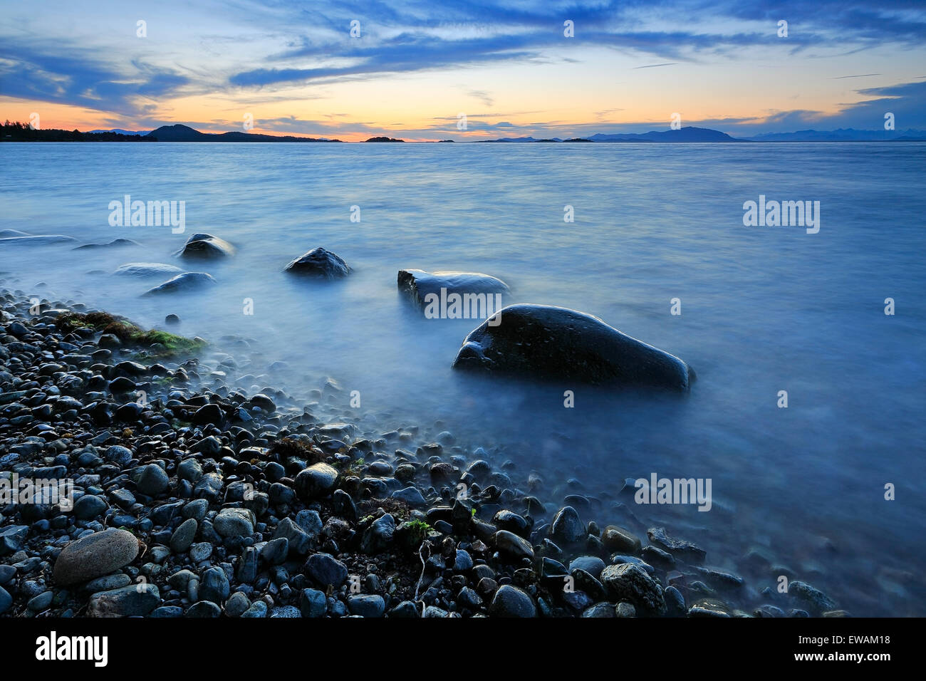 Sunset over Georgia Strait from north of Nanaimo looking towards the Winchelsea Islands, Vancouver Island, British Columbia Stock Photo
