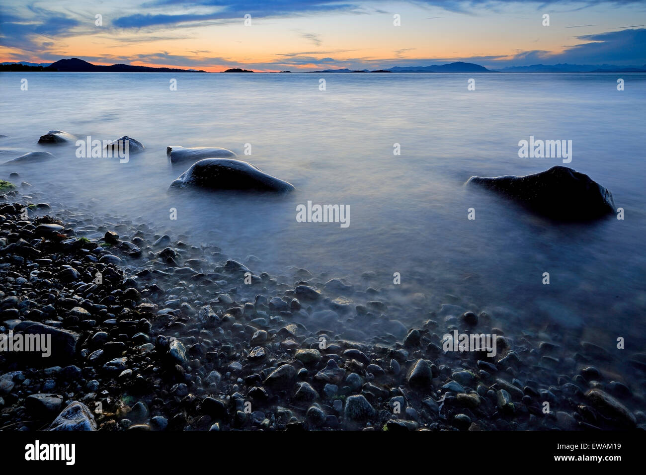 Sunset over Georgia Strait from north of Nanaimo looking towards the Winchelsea Islands, Vancouver Island, British Columbia Stock Photo