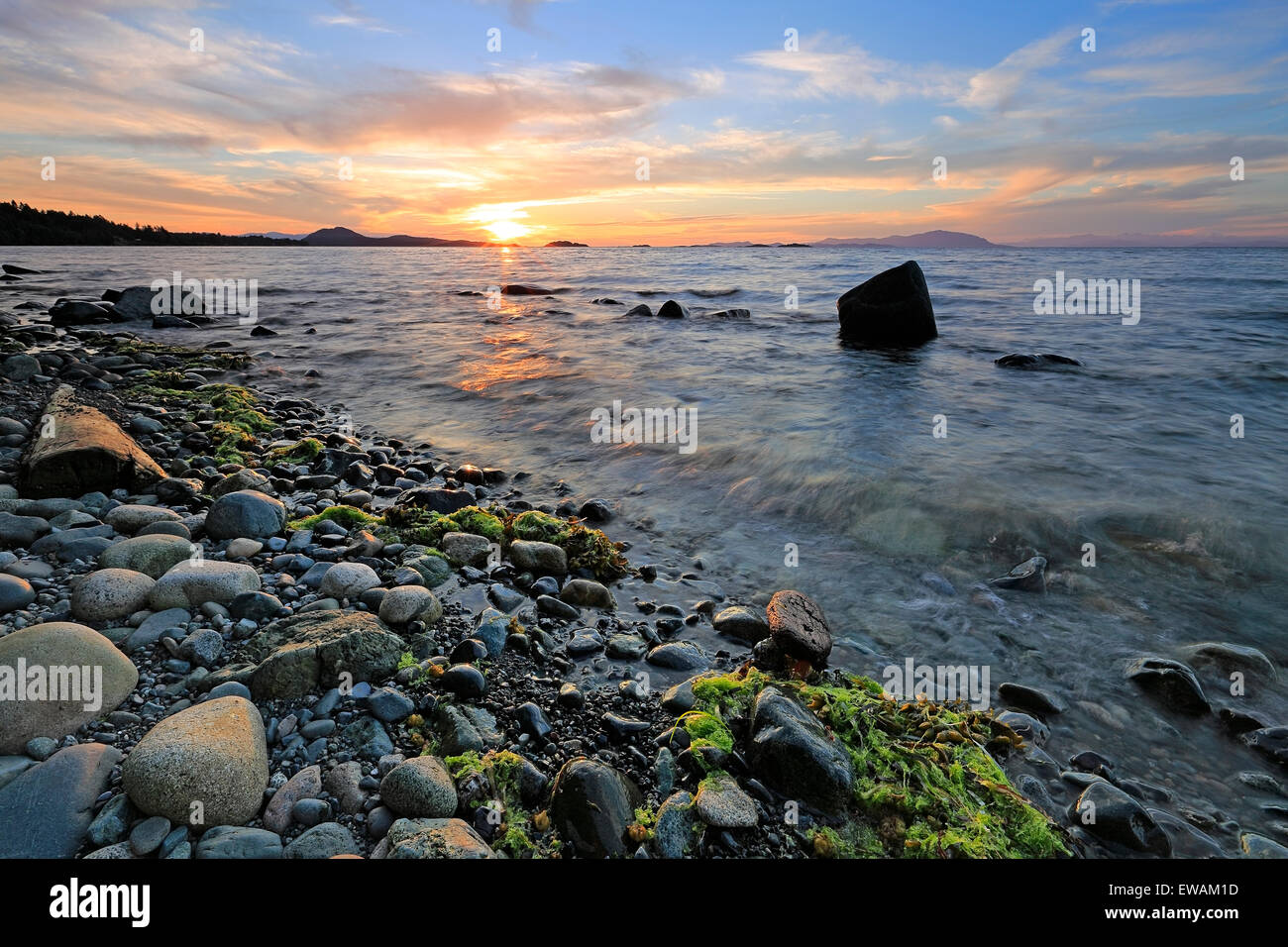 Sunset over Georgia Strait from north of Nanaimo looking towards the Winchelsea Islands, Vancouver Island, British Columbia Stock Photo