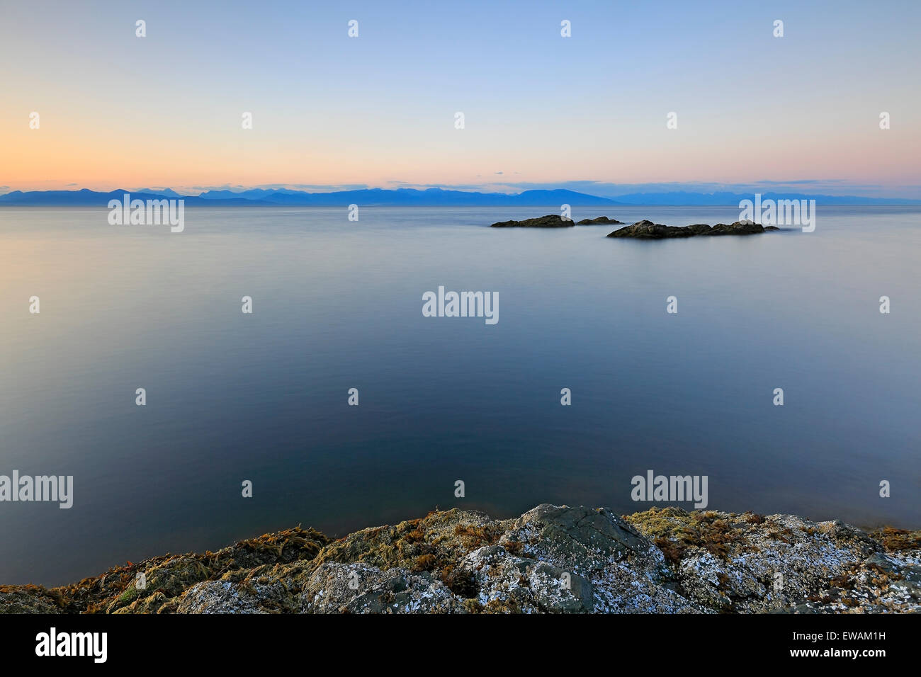 Sunset over Georgia Strait from north of Nanaimo looking towards the mainland, Vancouver Island, British Columbia Stock Photo