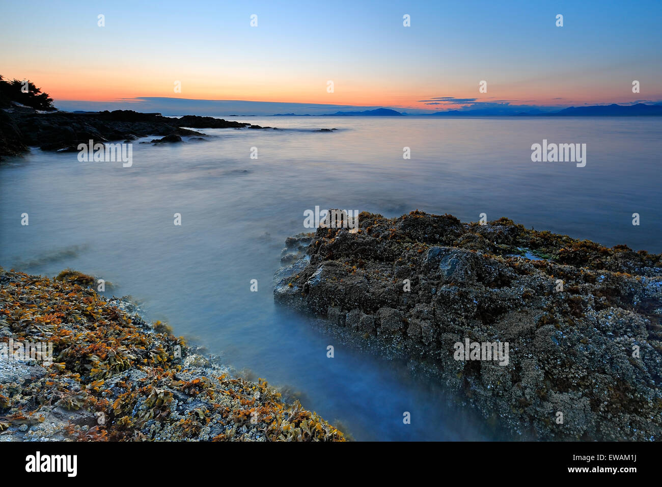 Sunset over Georgia Strait from north of Nanaimo looking towards the mainland, Vancouver Island, British Columbia Stock Photo