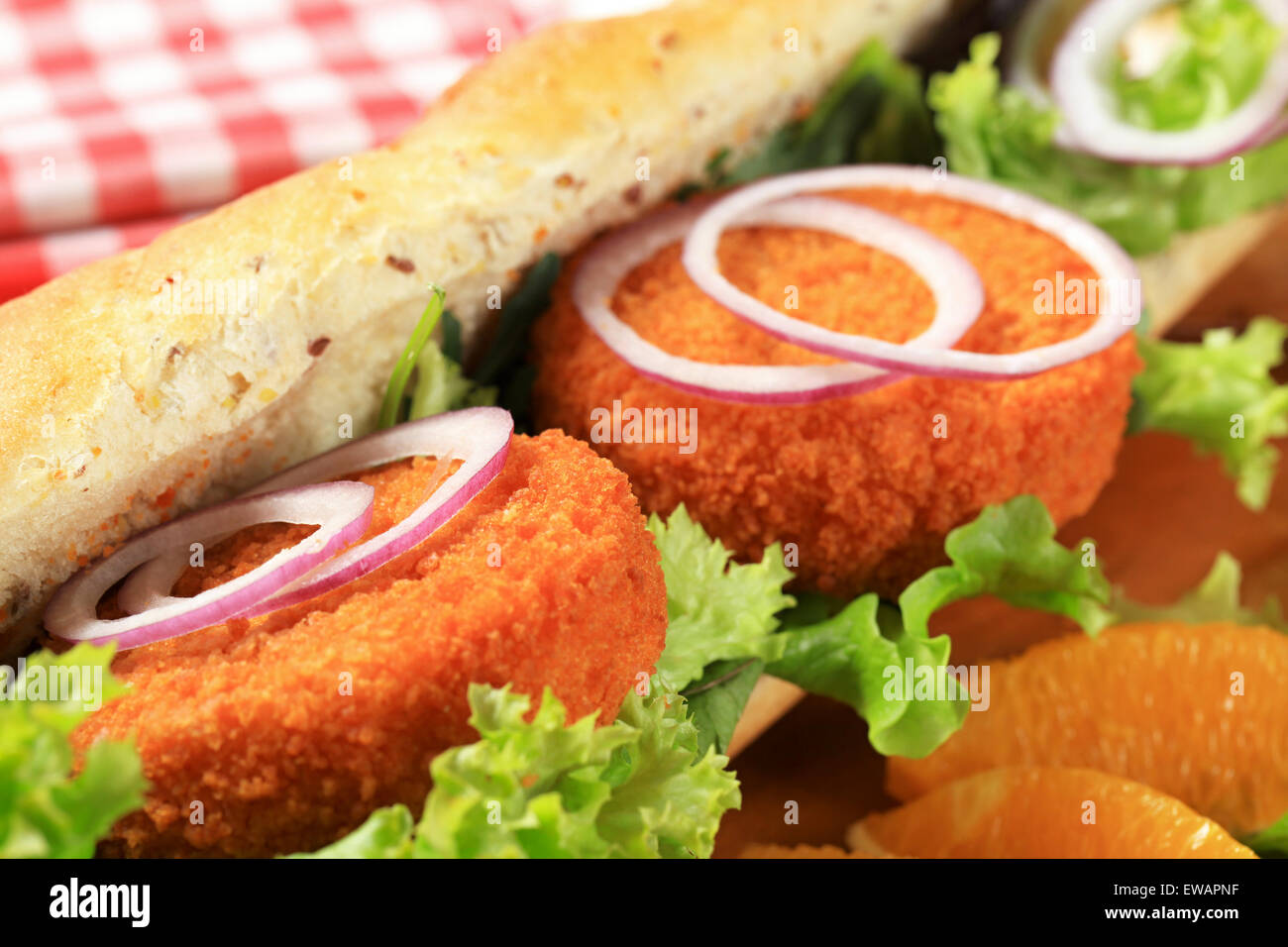 Sub sandwich with fried patties and lettuce Stock Photo