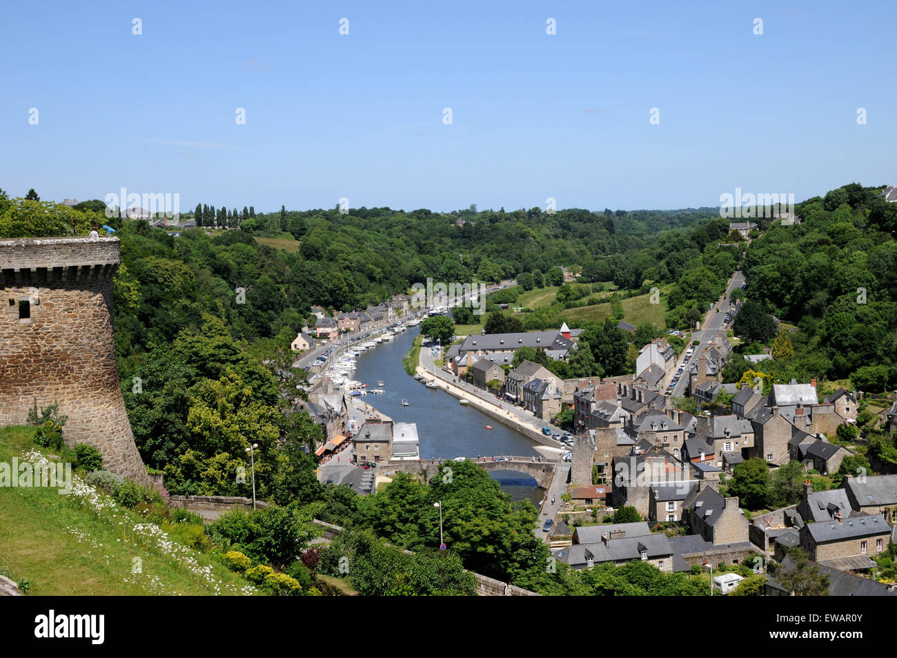 View from the ramparts at the medieval town of Dinan, Brittany looking down towards the River Rance, the Gothic Bridge and port. Stock Photo