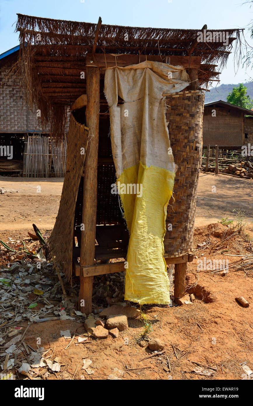 Basic latrine for a dwelling in a village around the edge of Inle Stock