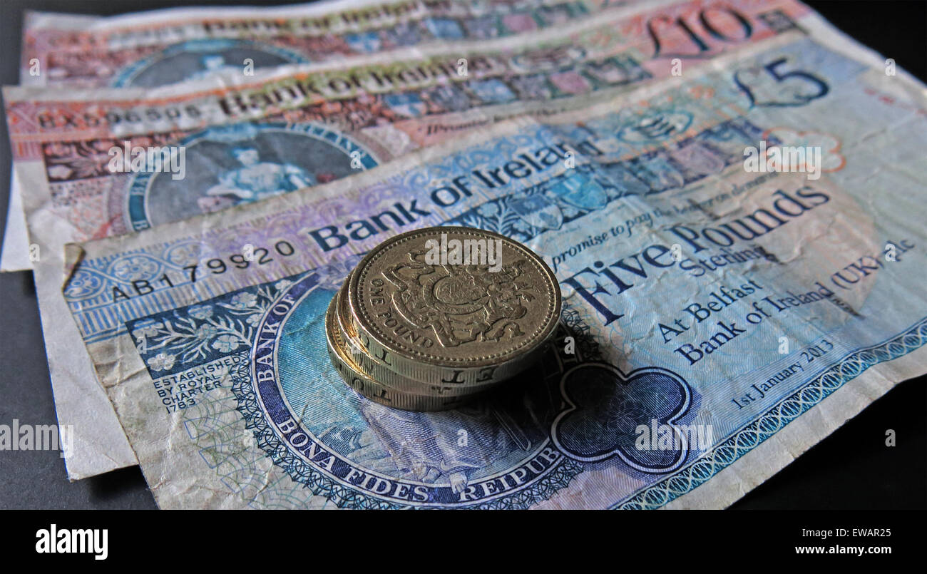 Northern Irish £5, £10 notes and pound coins, legal tender from the Bank Of Ireland  Belfast Stock Photo