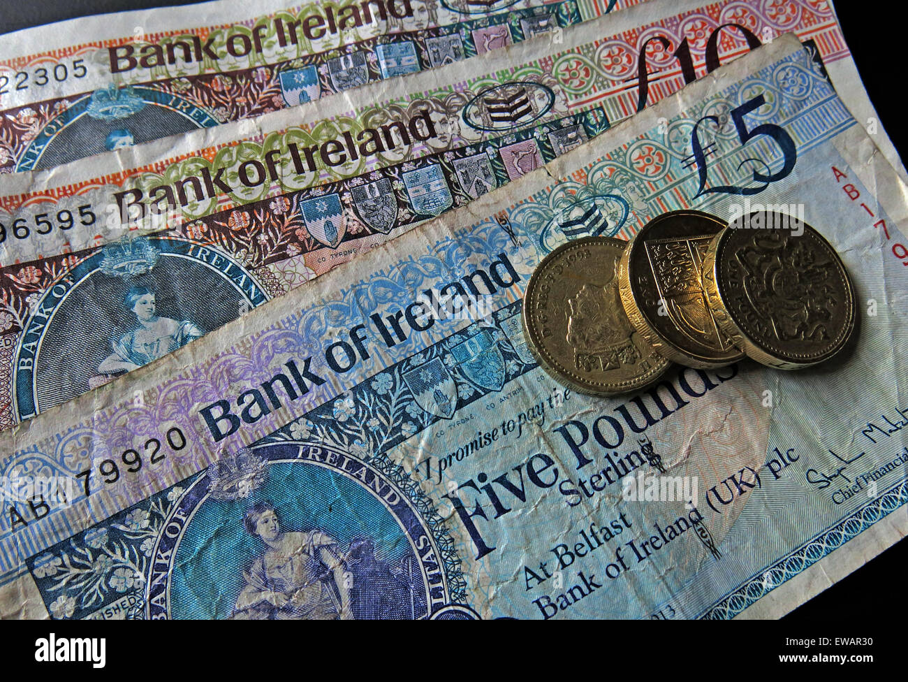 Northern Irish £5, £10 notes and pound coins, legal tender from the Bank Of Ireland , Belfast Stock Photo