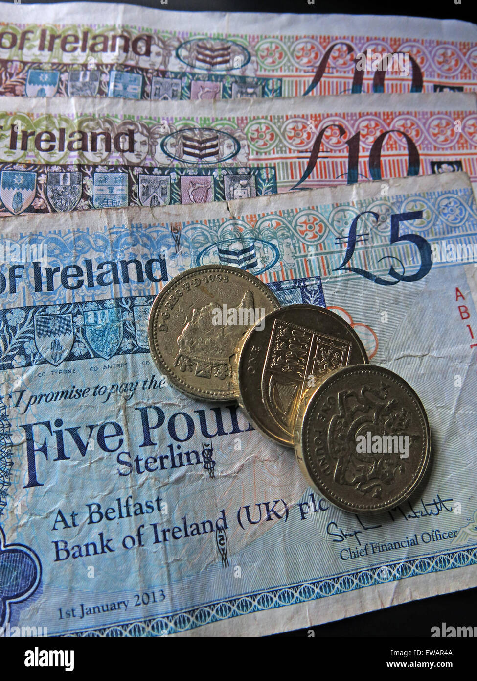 Northern Irish £5, £10 notes and pound coins, legal tender from the Bank Of Ireland , Belfast Stock Photo