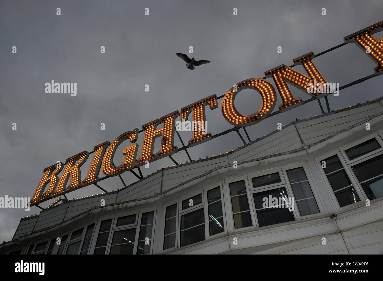 Brighton Pier Light on a dark cloudy day Stock Photo