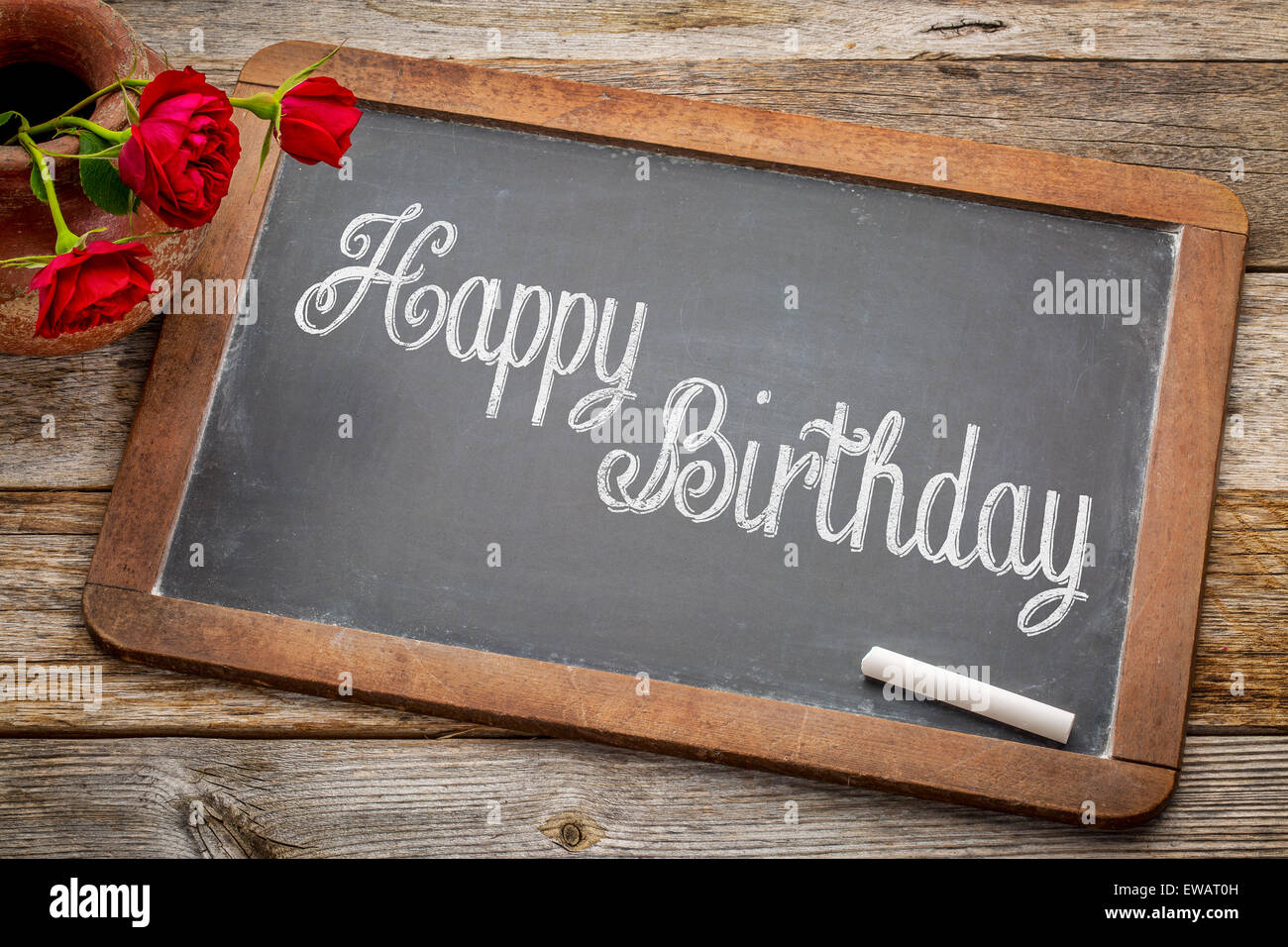 Happy Birthday Greetings White Chalk Text On A Vintage Slate Blackboard With Red Roses Against Rustic Wood Stock Photo Alamy