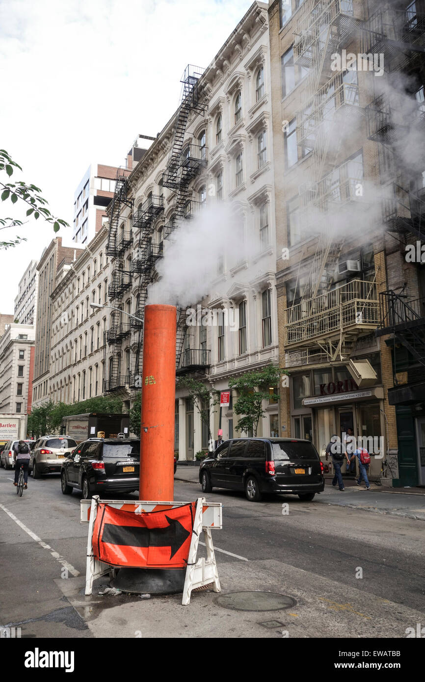 Steam vapor being vented in the streets of Manhattan, New york city, USA Stock Photo Alamy