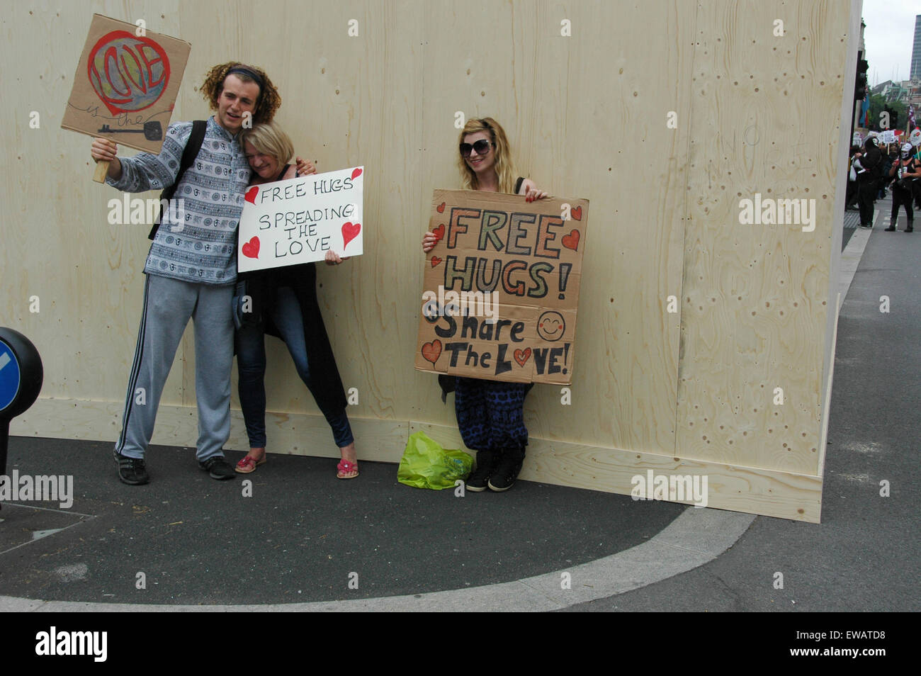 Free hugs on offer during the 'End Austerity Now' demonstration London 20 June 2015 Stock Photo