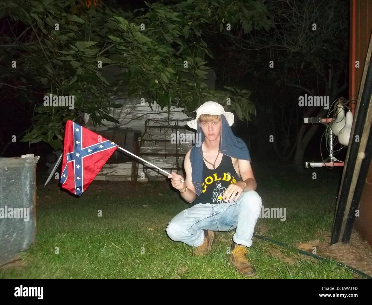 A photo from a white supremacist website showing Dylann Storm Roof holding a Confederate battle flag March 11, 2015. Roof murdered nine members of the Emanuel African Methodist Episcopal Church in a racially motivated killing on June 17, 2015 in Charleston, S.C. Credit:  Planetpix/Alamy Live News Stock Photo