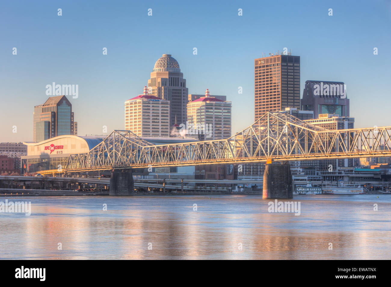 The George Rogers Clark Memorial Bridge crosses the Ohio River in front of the skyline of Louisville, Kentucky. Stock Photo