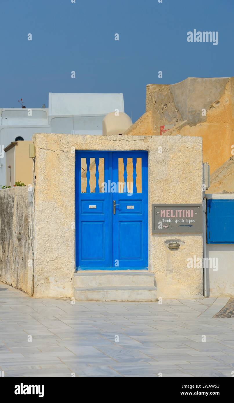 Blue painted doors on the island of Santorini Greece. Stock Photo