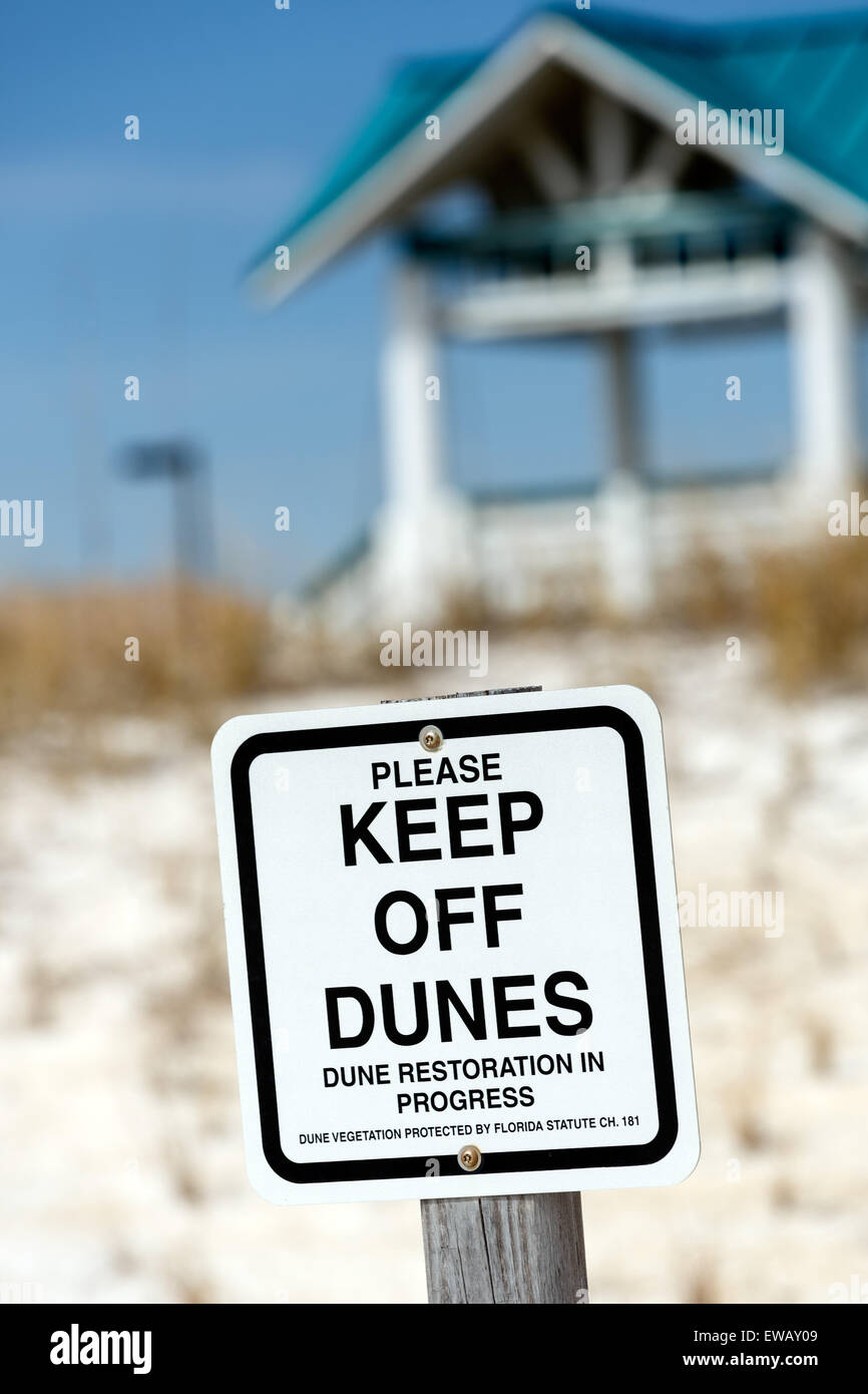Sand Dune management protecting and improvement the dunes warning sign to keep off dunes at Fort Walton Beach Florida Panhandle USA Stock Photo