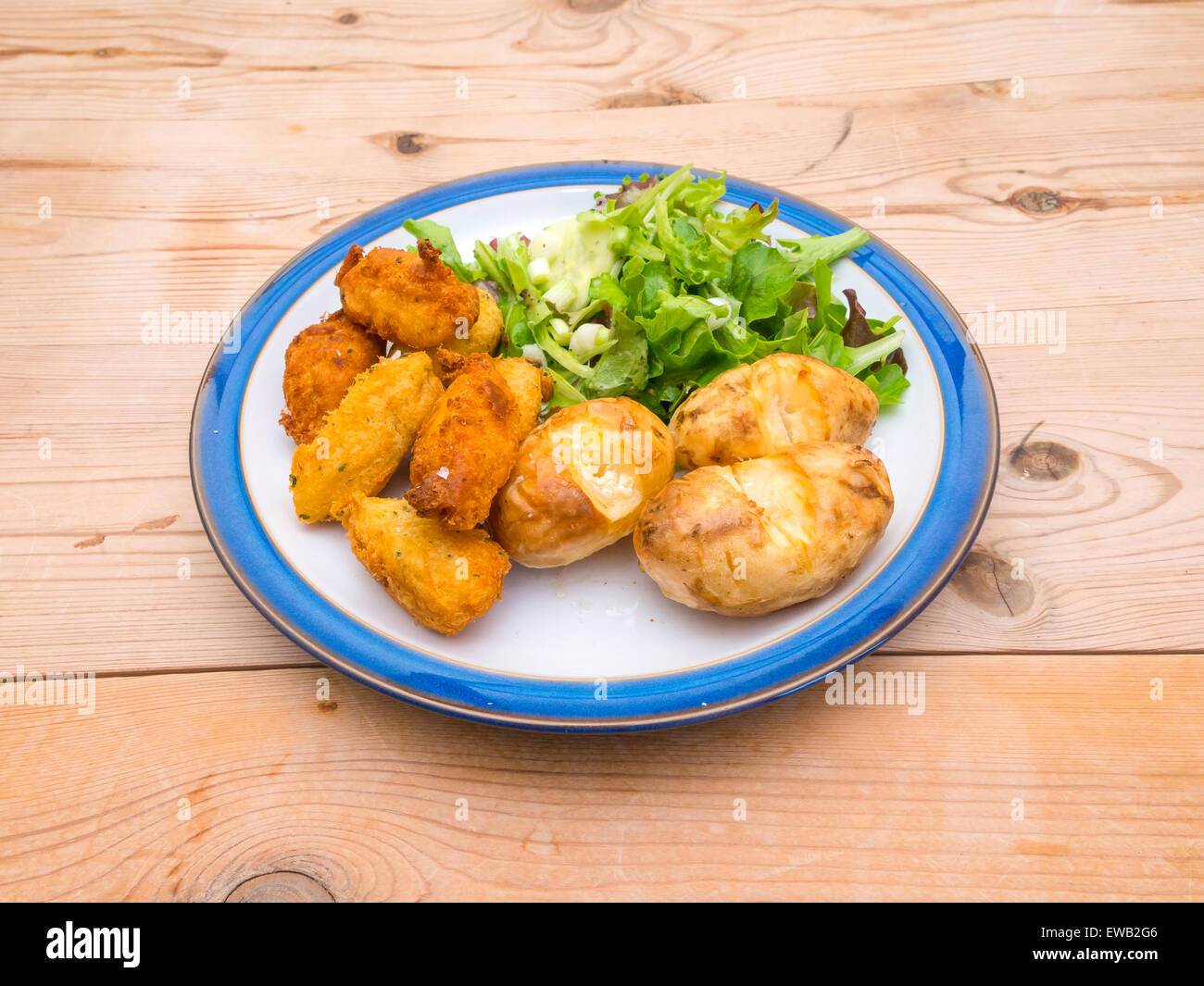 Cod Croquettes classic Brazilian or Portuguese dish served with salad