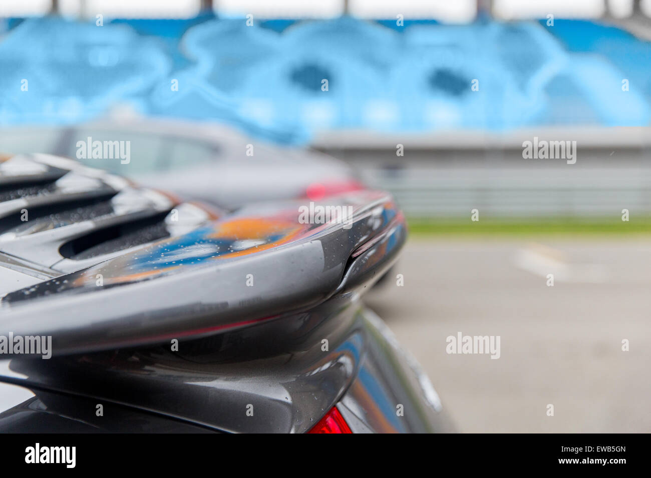 close up of car spoiler on speedway at stadium Stock Photo
