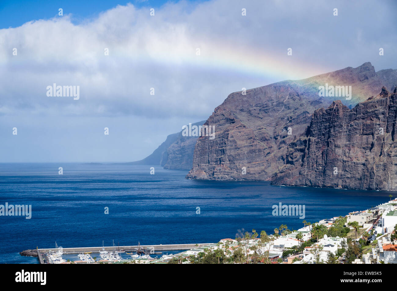 Rainbow over Los Gigantes cliffs and resorts, Tenerife Stock Photo
