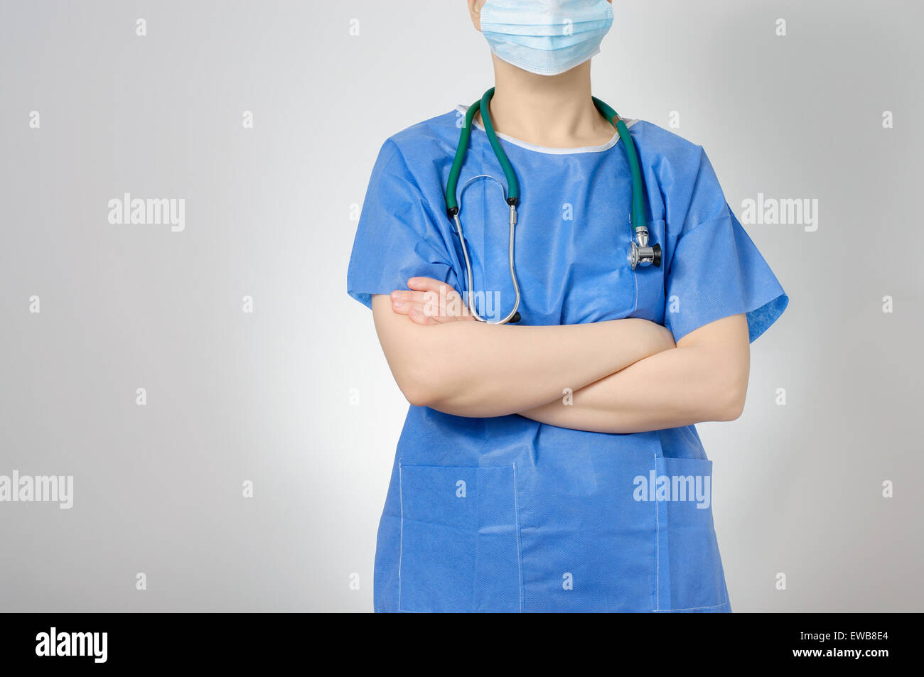 Confident female doctor crossing her arms Stock Photo